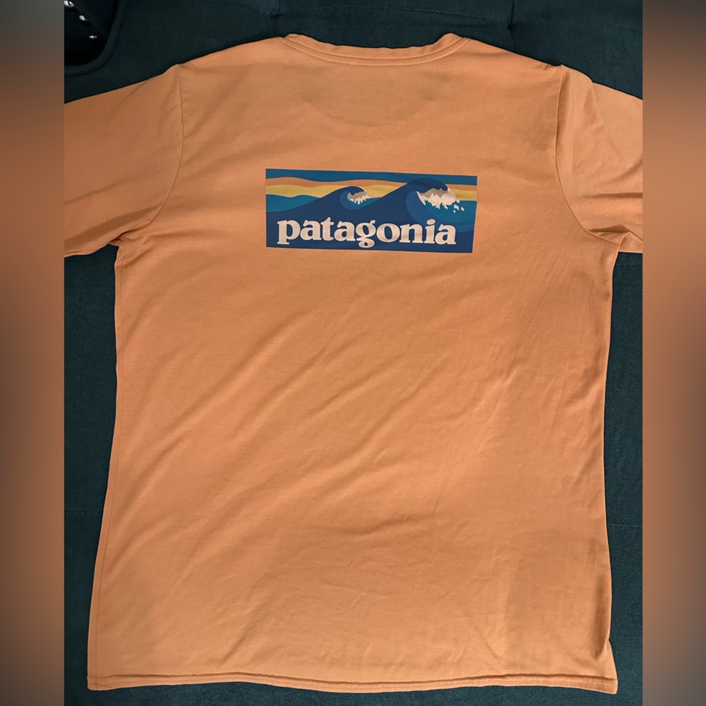 Patagonia women’s Orange Long Sleeve Tee rash/guard material